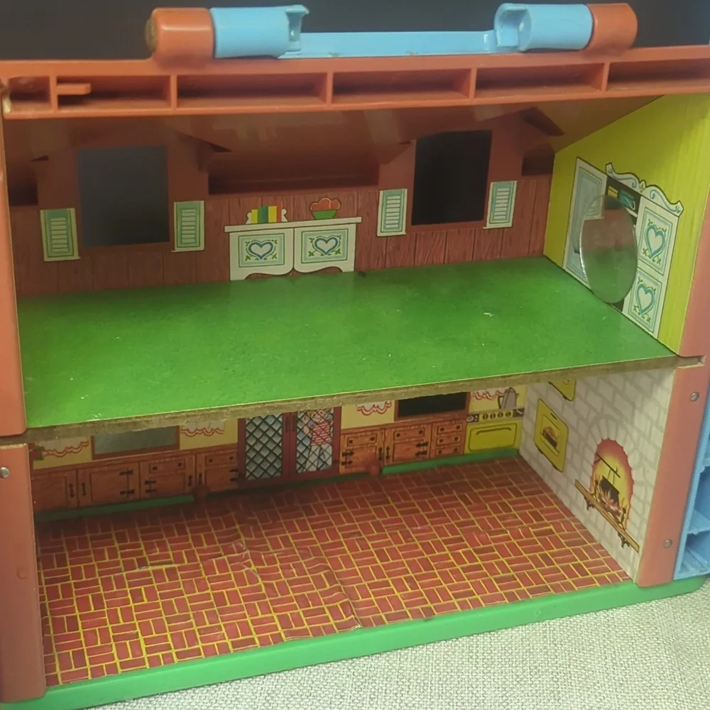 B) Fisher-Price Tudor House #952 brown & white, 2-story house complete w/Nursery